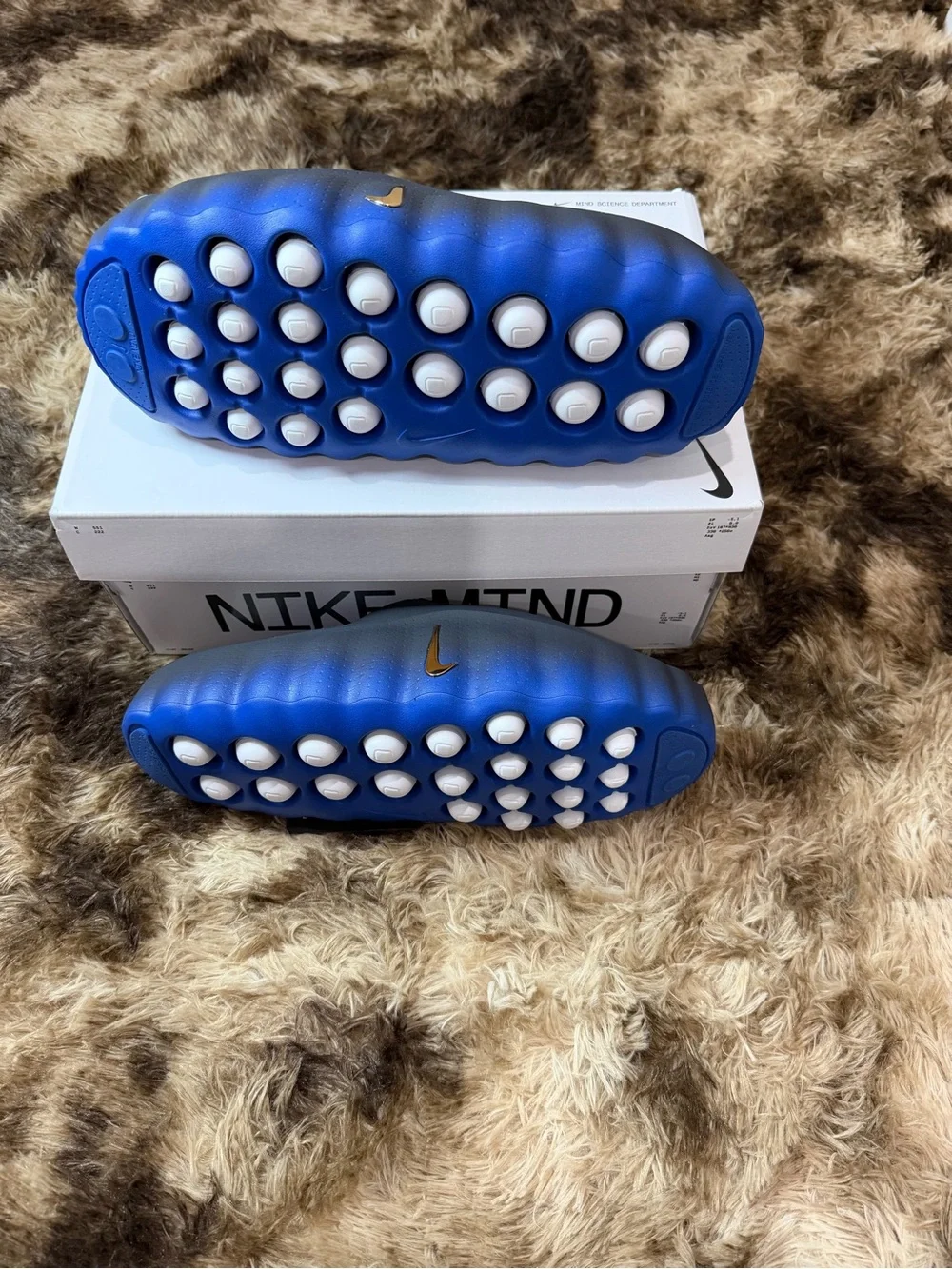 Nike Men’s Slip-On Foam Clogs in Blue and Gold